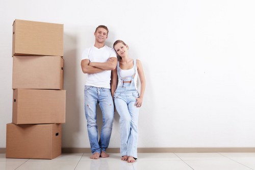 Moving van and boxes for a home relocation in Colliers Wood