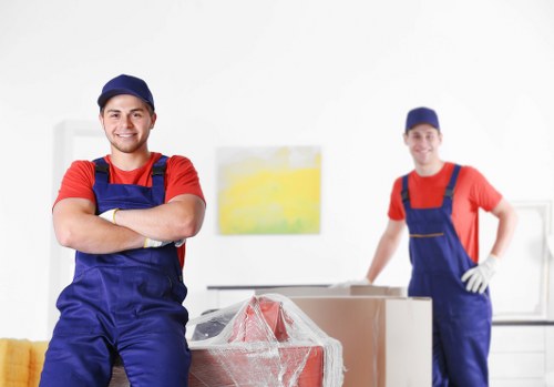 Careful unloading of furniture and boxes during a man and van removal