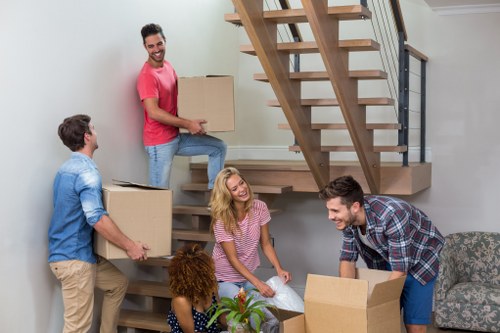 Moving home support for Colliers Wood residents with boxes and furniture