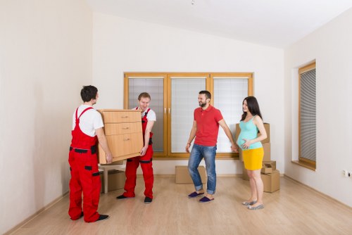 Collierswood moving staff handling furniture carefully