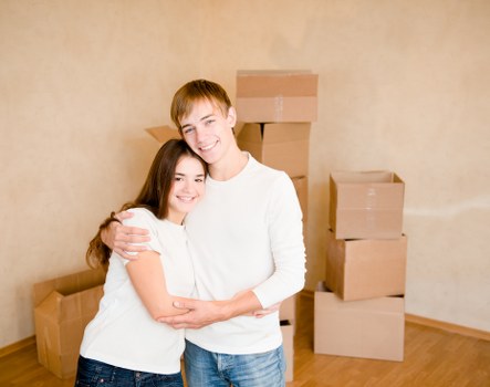 Furniture and boxes being loaded for a removals job near Colliers Wood