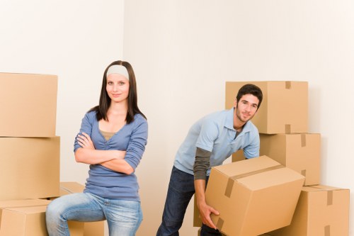 Packing and loading furniture for a home move in Colliers Wood