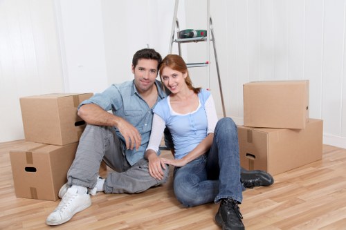 Packed boxes and furniture ready for local transport