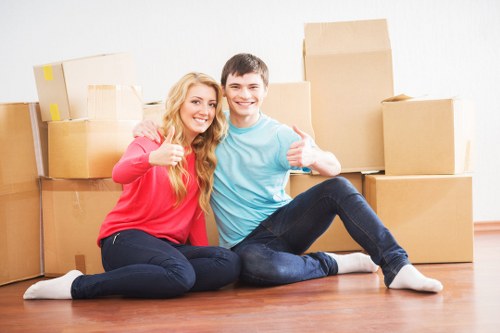 Loading household furniture into a removal truck