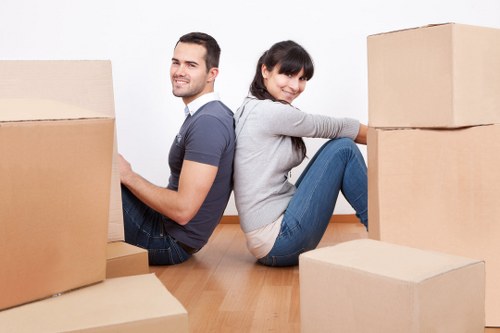 Packed furniture and boxes ready for a local house move in Colliers Wood