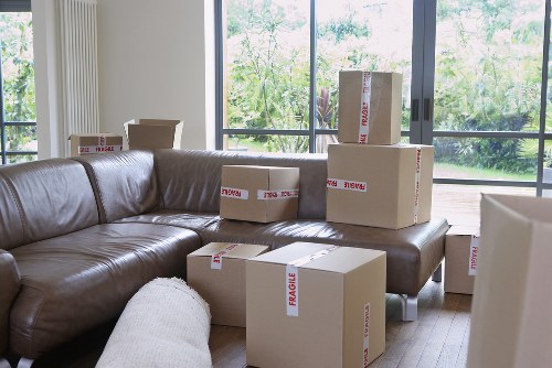 Local movers handling office furniture in Colliers Wood